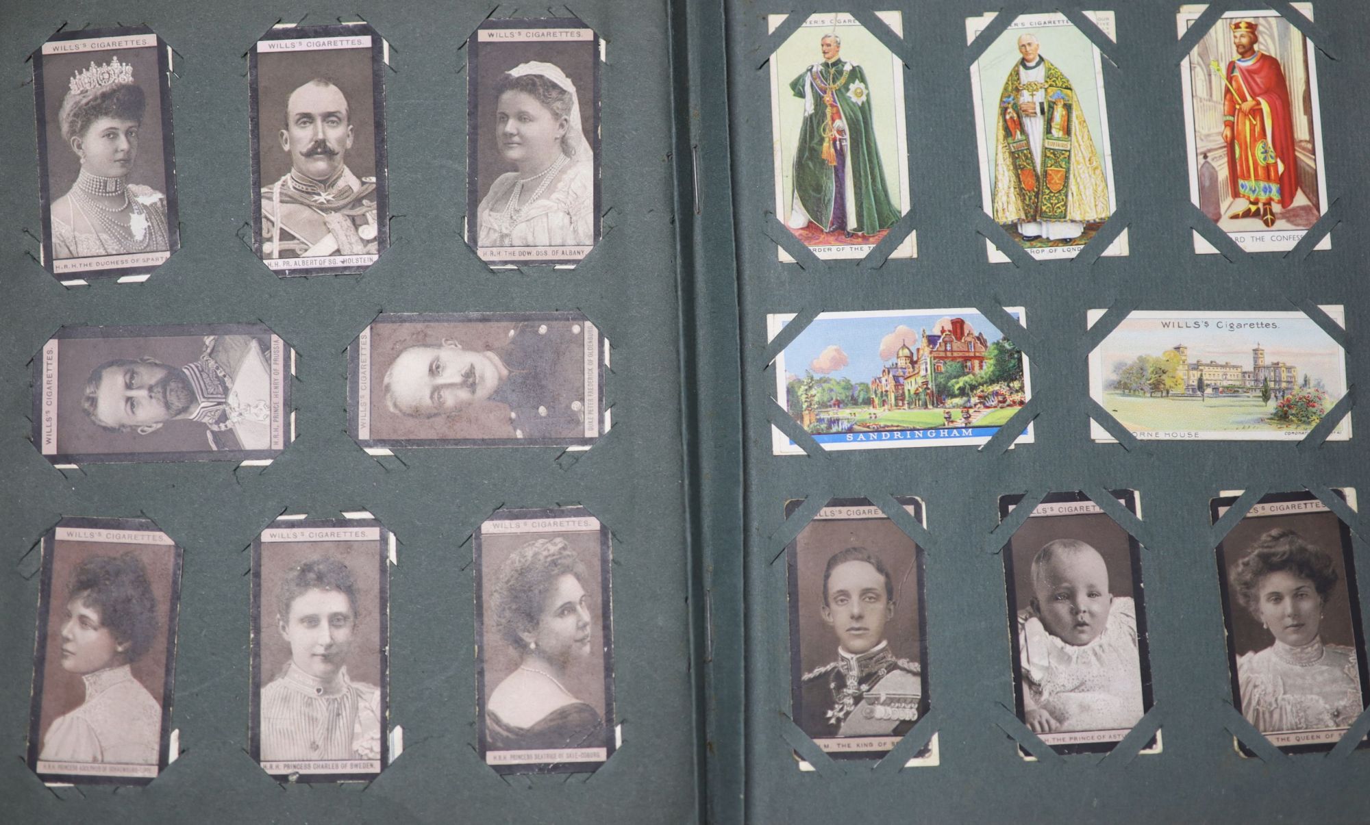 A collection of assorted cigarette cards and tea cards